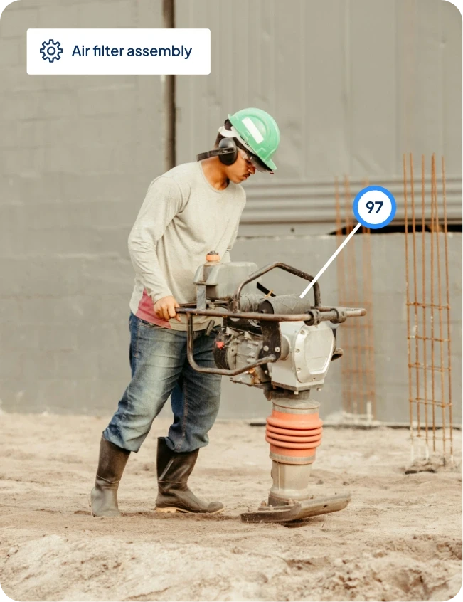 Technician operating compactor with air filter assembly part identification overlay